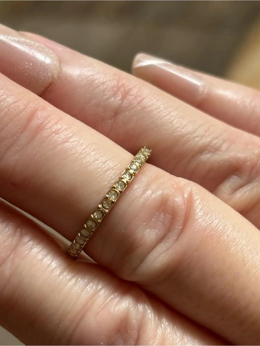Delicate Gold Tone Eternity Band with Clear Stones